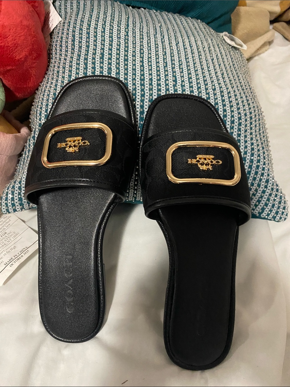 Coach Black Slide Mules with Gold Buckle Accent